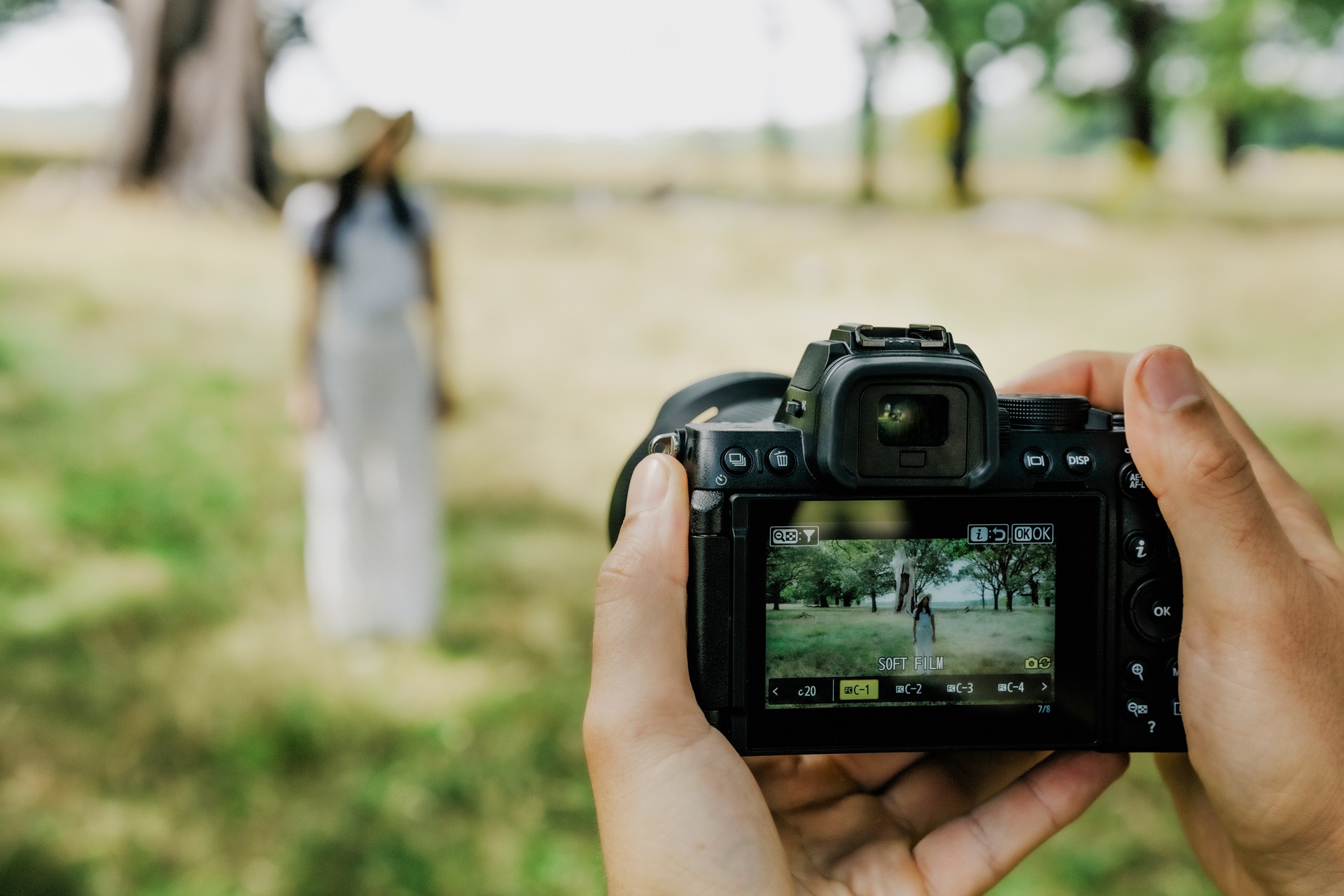 A person holding a camera